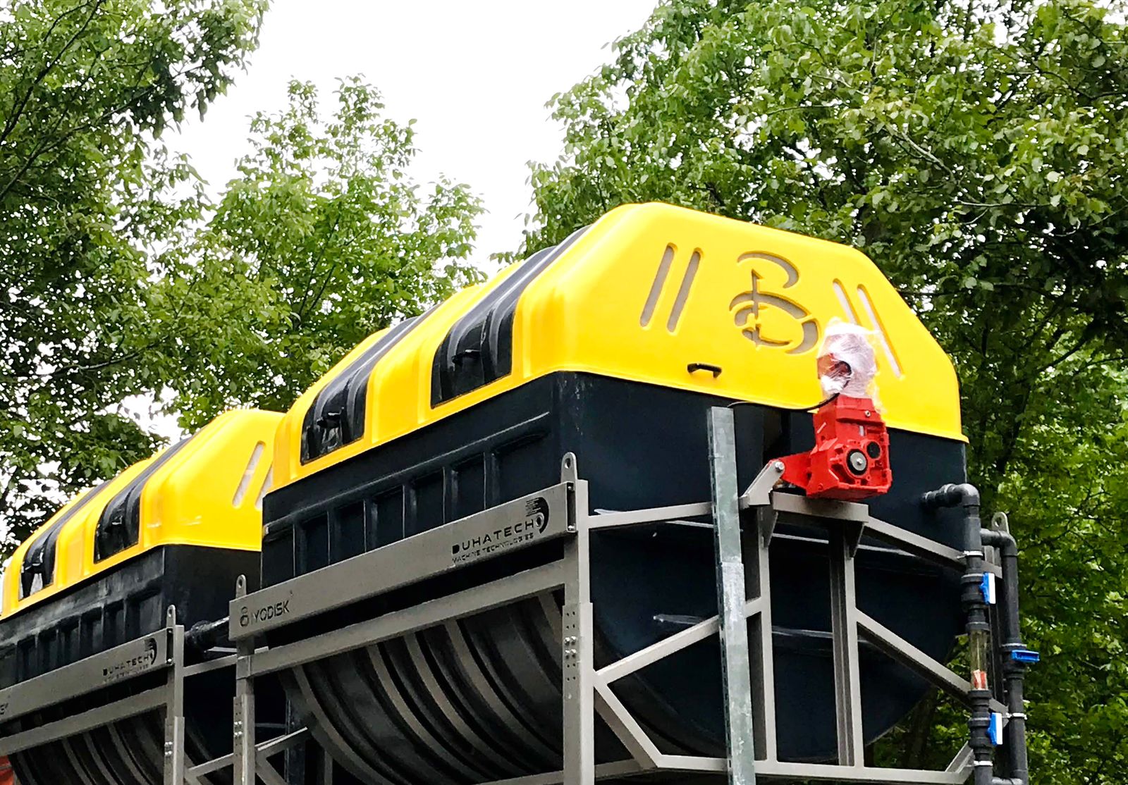 TES Biodisc outdoor installation with yellow cover